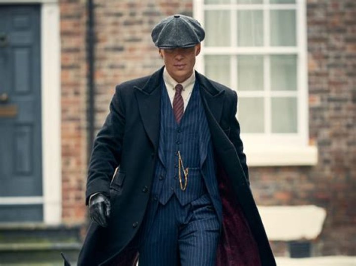 Cillian Murphy as Tommy Shelby and Jordan Bolger as Isiah in P.B