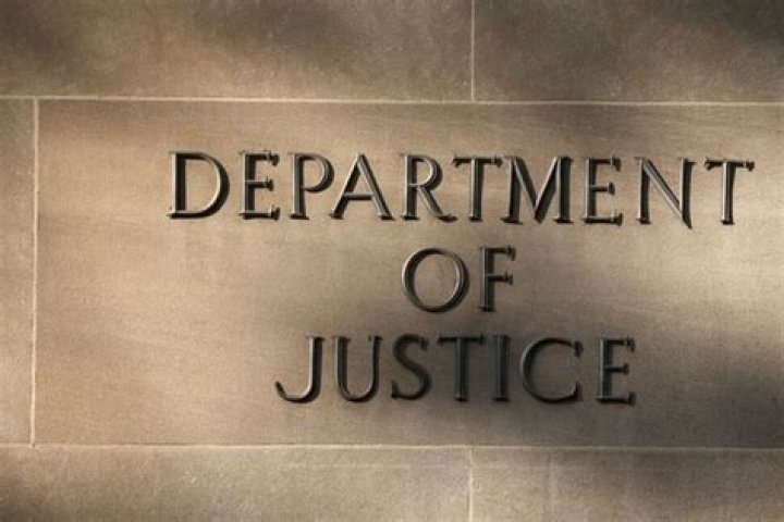 Justice Department sues exTrump aide Peter Navarro to produce White