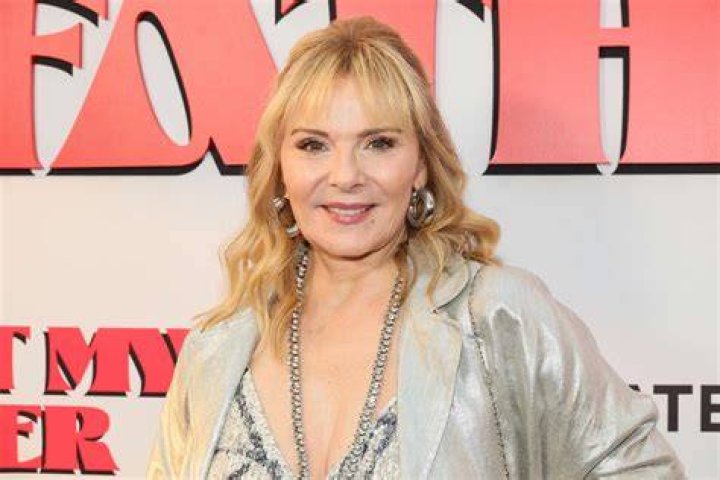 Kim Cattrall's height, weight. She prefers natural aging