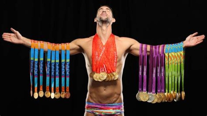 Michael Phelps Poses With All 23 Gold Medals For First Time On His 12th