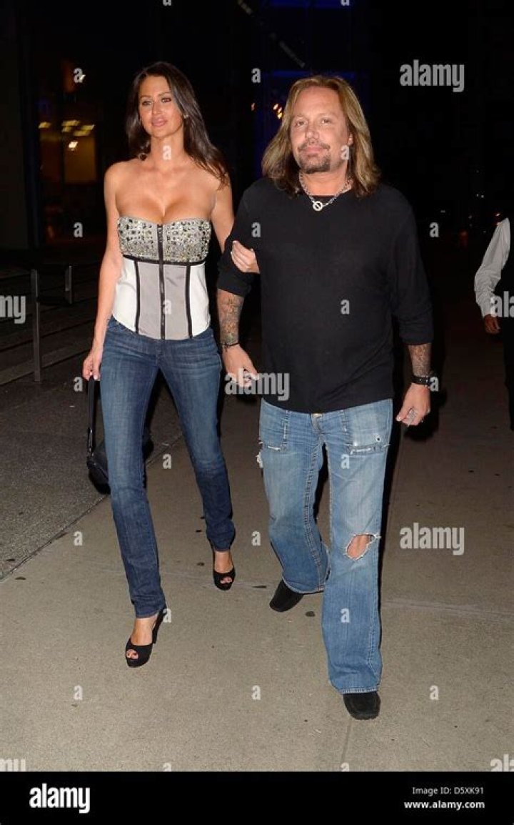 Vince Neil arriving at BOA Steakhouse with a new girlfriend for